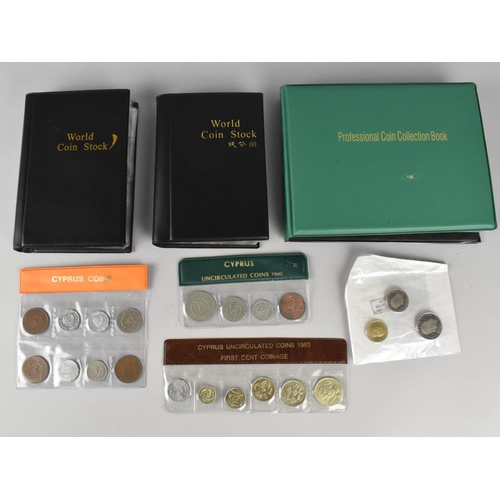 311 - Three Coin Stock Albums Containing Various World Coins, Together with Cyprus Coin Wallets etc