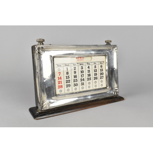 35 - A Silver Mounted Desktop Top Perpetual Calendar, 21cm Long