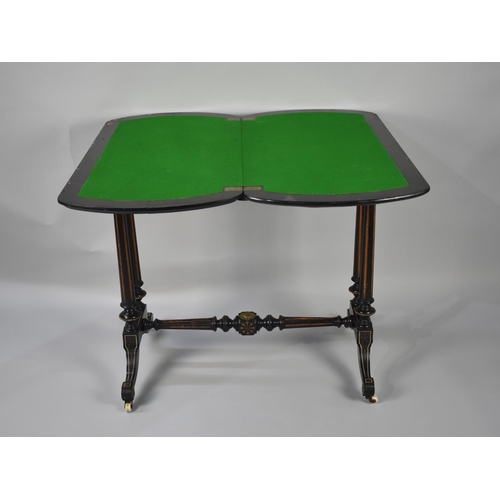 43 - A Victorian Aesthetic Ebonised Lift and Twist Games Table with Ivory Stringing, (Submission Referenc... 