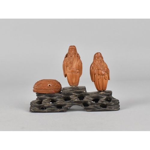 449 - Two Chinese Late Qing Carved Hediao Nut in the Form of Chinese Gods on Carved Stand, Together with a... 