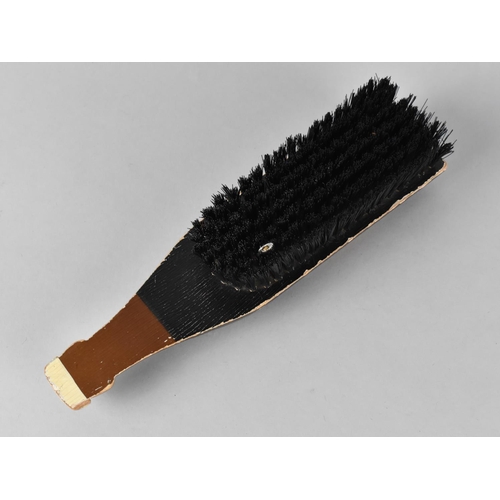 46 - A Novelty Clothes Brush in the Form of a Bottle of Guinness Stout, 21.5cm