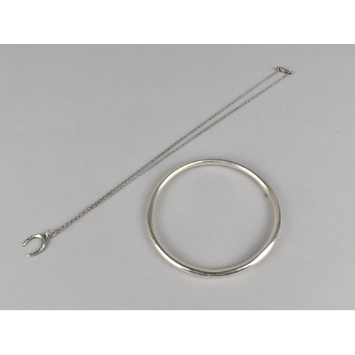 488 - A Charles Horner Slave Bangle and a Horseshoe Pendant on Silver Chain, both Hallmarked for 1922 and ... 