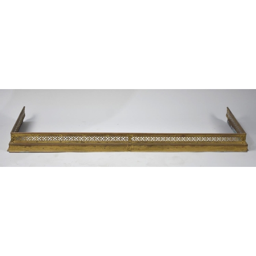 551 - An Edwardian Pierced Brass Fire Kerb, 131cm Wide