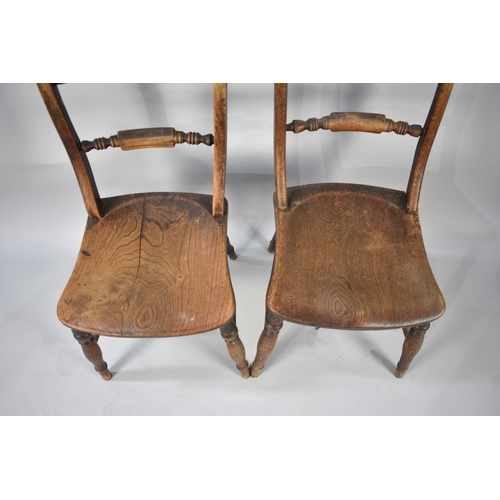 556 - A Pair of Elm Seated Kitchen Chairs