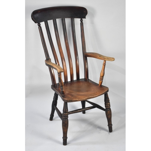 557 - An Elm Seated Country Style Kitchen Armchair