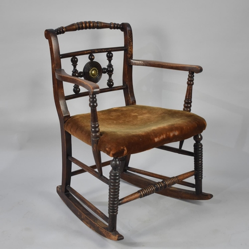 558 - A Late Victorian/Edwardian Rocking Armchair with Velvet Upholstered Seat