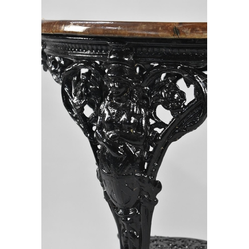 559 - A Cast Metal Black Painted Britannia Pub Table with Wooden Top, 62cm Diameter Top