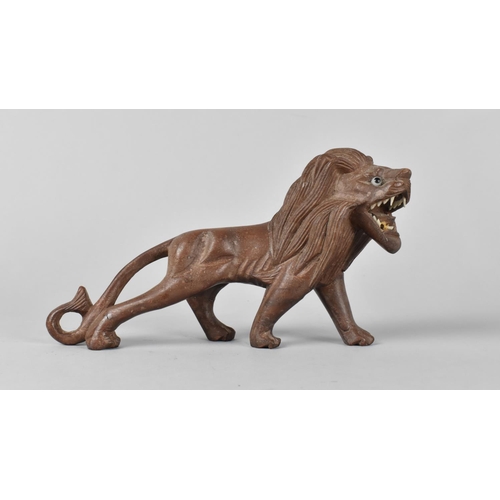 63 - A Oriental Carved Wooden Study of a Lion, 19.5cm Long