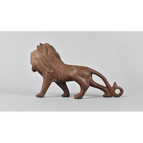 63 - A Oriental Carved Wooden Study of a Lion, 19.5cm Long