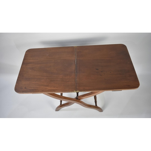 75 - A Late Victorian/Edwardian Folding Table with X Frame Base, 88cm Wide