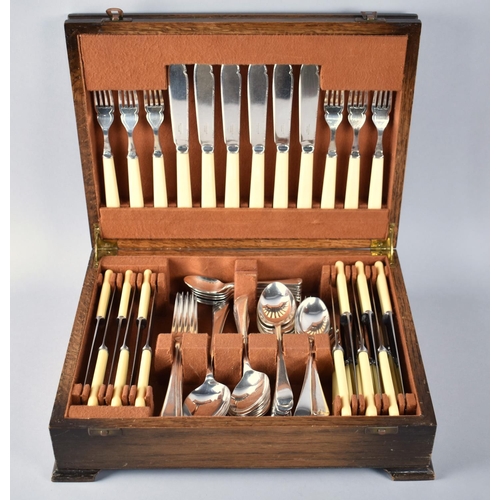 83 - An Art Deco Oak Cased Canteen of Cutlery