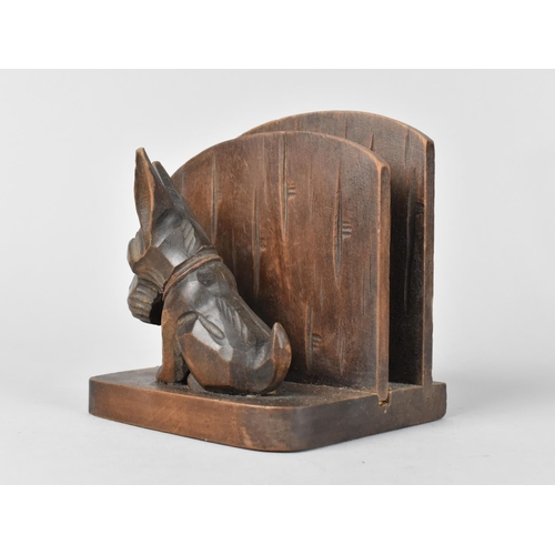 9 - A Mid 20th Century Carved Wooden Letter Rack Decorated with Dog Looking Sheepish, 12cm High