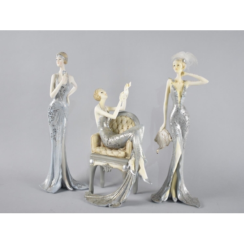 131 - A Collection of Three Resin Figures, Tallest 33cms High