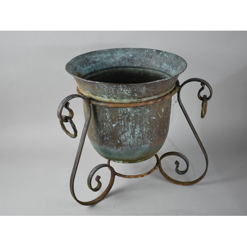 213 - A Wrought Iron Scrolled  Stand Containing Planter, 33cms Diameter and 39cms High