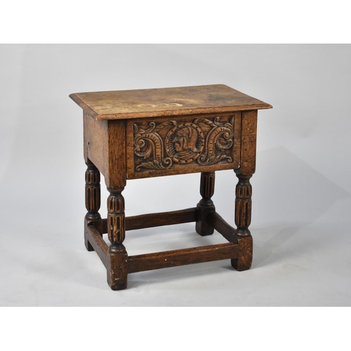 102 - A Carved Oak Rectangular Topped Stool, 48cms Wide