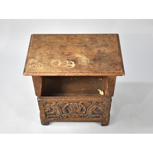 102 - A Carved Oak Rectangular Topped Stool, 48cms Wide