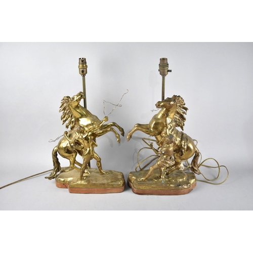 104 - A Pair of Brass Marley Horse Table Lamps, 46.5cms High