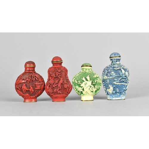 125 - A Collection of Four Modern Chinese Snuff Bottles with Relief Decoration