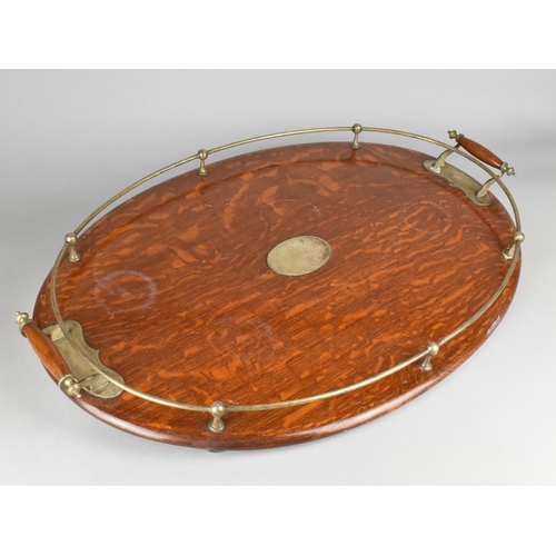 138 - An Edwardian Oak Oval Two Handled Tray With Silver Plated Gallery, 66cms Wide