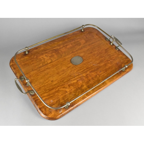 139 - An Edwardian Rectangular Oak Tray with Silver Plated Gallery and Two Handles, 60cms Wide