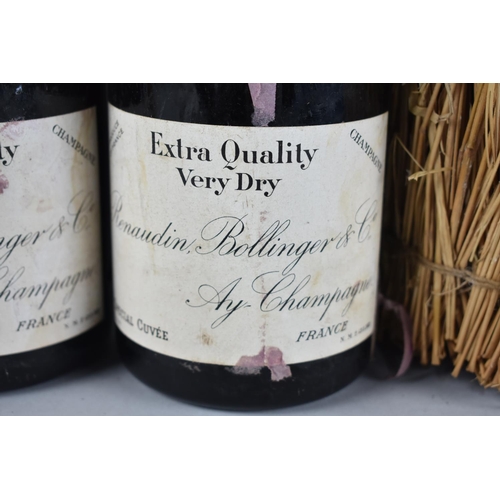 142 - A Bottle of Extra Quality Very Dry Champagne by Renaudin Bollinger and Co together with a Similar Bo... 