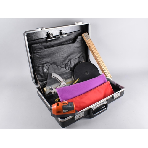 200 - A Briefcase Containing Scale Rules, Folding Ruler, Tape Measure, Drawing Instruments Etc