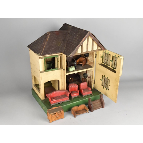 210 - A Triang Dolls House and Furniture