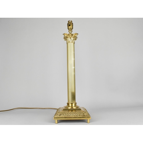 22 - A Modern Brass Table Lamp Base in the Form of a Reeded Corinthian Column, 51cms High