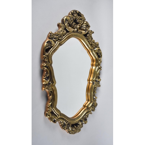 287 - A Gilt Framed Wall Mirror, with Ornate Scrolled Border, 66x40cm