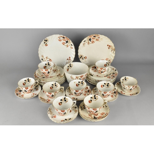 297 - An Edwardian Floral Decorated Tea Set of Wrythen Form to Comprise Nine Cups, Twelve Saucers, Twelve ... 