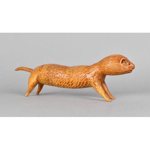 41 - A Carved Lime Wood Study of a Ferret, 28cms Long