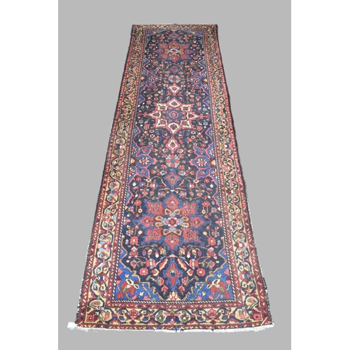 471 - A Persian Handmade Bakhtiari Runner, C.1920, 383x115cms