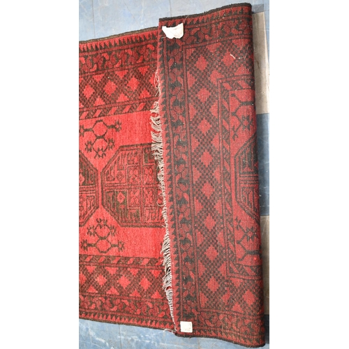 486 - A Vintage Persian Pattern Rug on Red Ground, 123x78cm