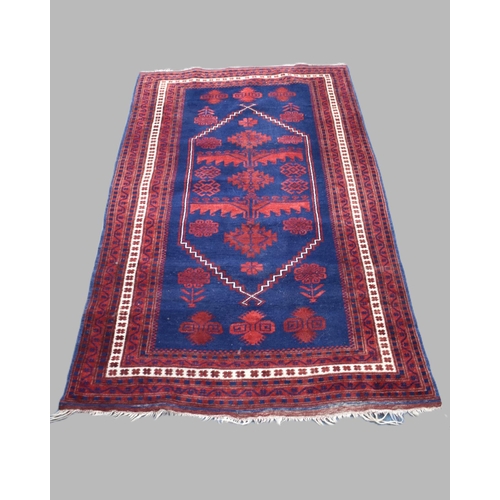 492 - A Patterned Rug on Red and Blue Ground, 183x109