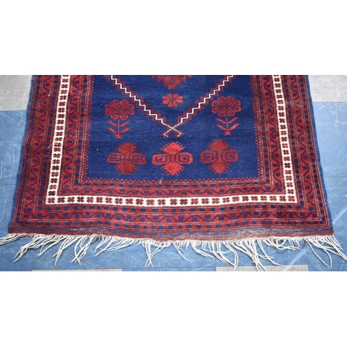 492 - A Patterned Rug on Red and Blue Ground, 183x109