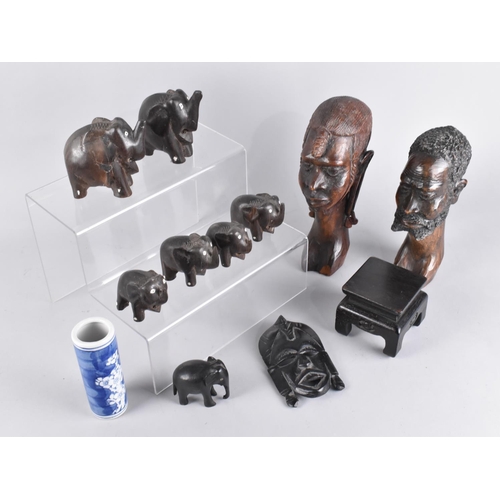 502 - A Collection of Various Carved African Souvenir Busts, Elephants, Vase Stand Etc