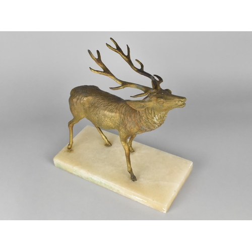 58 - A Bronze Effect Study of a Stag Set on Marble Effect Base, 28cms Wide