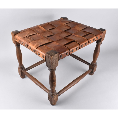 64 - A Mid 20th Century Woven Leather Topped Oak Framed Stool, 39cms by 31cms