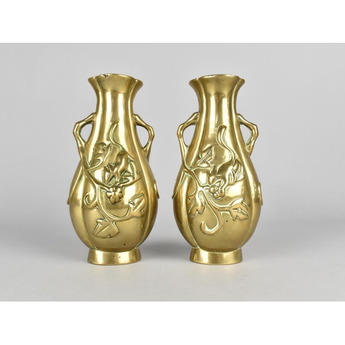 67 - A Pair of Oriental Polished Bronze Two Handled Vases Decorated in Relief with Squirrel, 17.5cms High