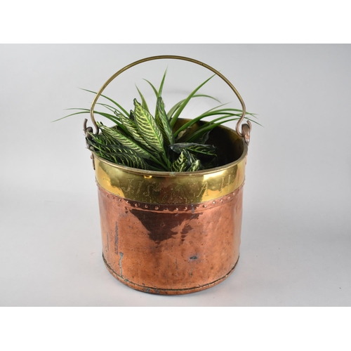 79 - A Copper and Brass Cylindrical Coal Bucket with Loop Handle, Monogrammed to Top, 33cms Diameter