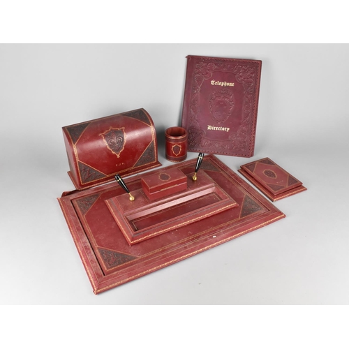 92 - A Mid 20th century Tooled Leather Desk Set Comprising Pen Stand, Blotter, Letter Rack, Cylindrical P... 