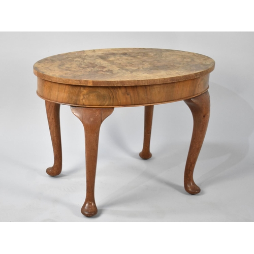 96 - A Mid 20th Century Burr Walnut Oval Topped Stool, 56cms Long