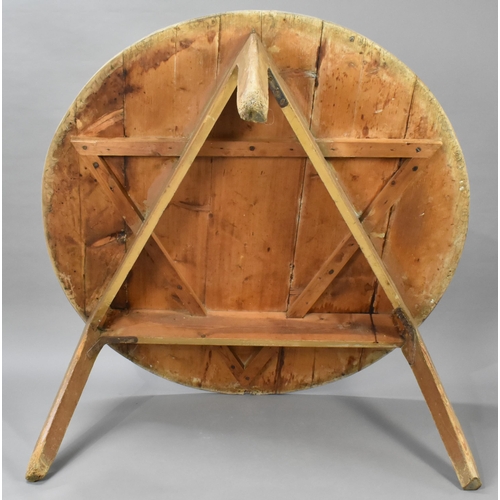 438 - A Very Large Early Pine Cricket Table, Six Plank Top, 137cm Diameter Top and 74cm high