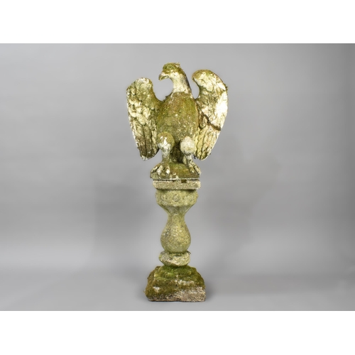 436 - A Weathered Composition Stone  Study of An Eagle on Plinth Base, 116cm High