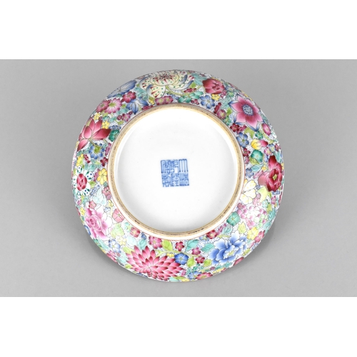 394 - A Late Chinese Qing Period Porcelain Famille Rose 'Hundred Flowers' Dish, Blue Qianlong Seal Mark to... 