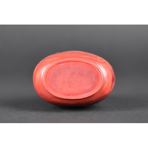 378 - A Chinese Red Hardstone Snuff Bottle with White Metal and Jade Stopper, 7.5cm High