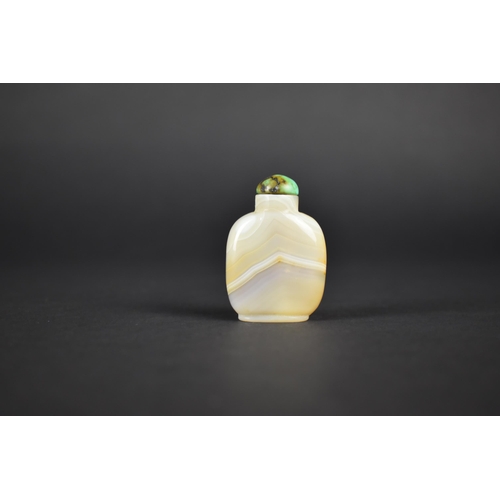 374 - A Chinese Carved Hardstone Snuff Bottle Decorated with Bat in Relief with Green and Black Veined Sto... 