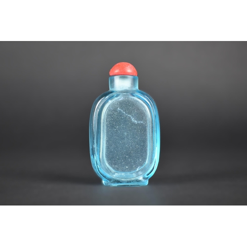 369 - A Chinese Clear Blue Glass Snuff Bottle, with Stopper, 7cm High
