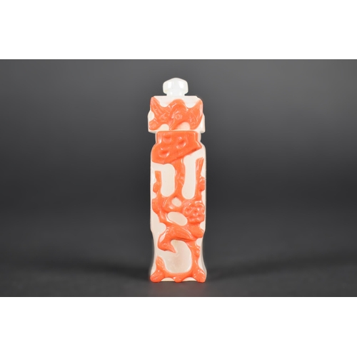 368 - A Carved Chinese Overlay Snuff Bottle, Opaque White and 'Coral' Decoration in Imitation of Shadow Ag... 