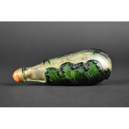364 - A Chinese Overlaid Green Glass Snuff Bottle Decorated with Fish and Lily Pad Complete with Brass Mou... 